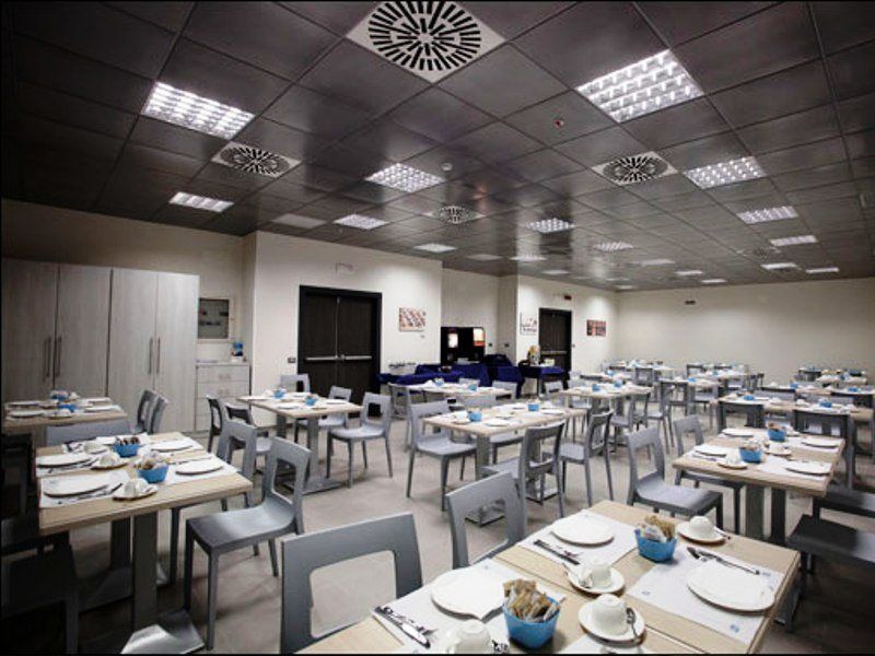 فندق ارتيس روما المطعم الصورة